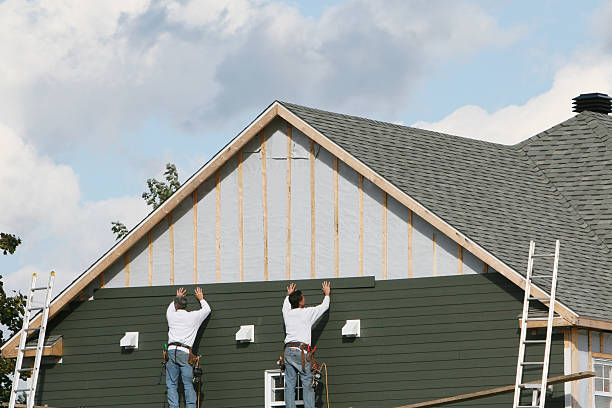 Professional Siding Installation technician working in Lowell, NC